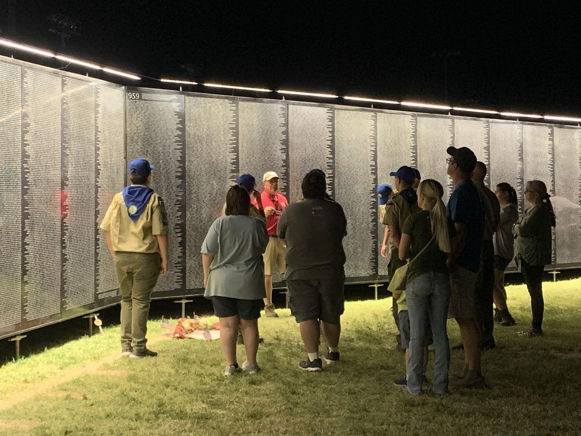 Scouts gather for a guided night tour of The Wall